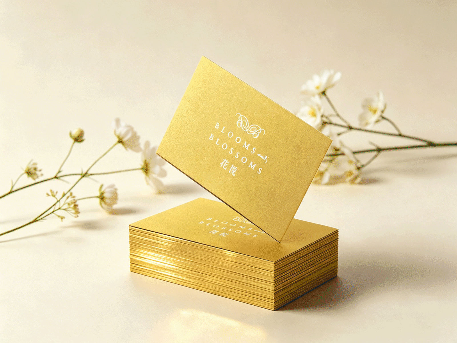 A gold card with a flower on it.

Description generated by AI